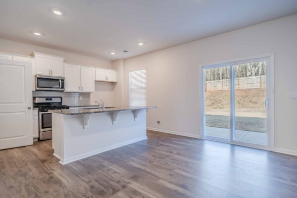 Gourmet kitchen in Greenville, SC, featuring stainless steel appliances and granite countertops