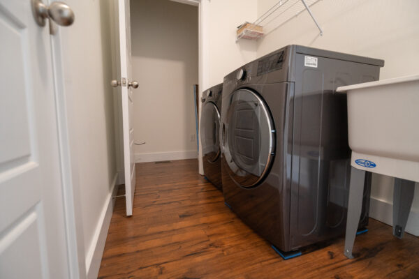 Laundry Room in Travelers Rest, SC, featuring stainless steel appliances and granite countertops