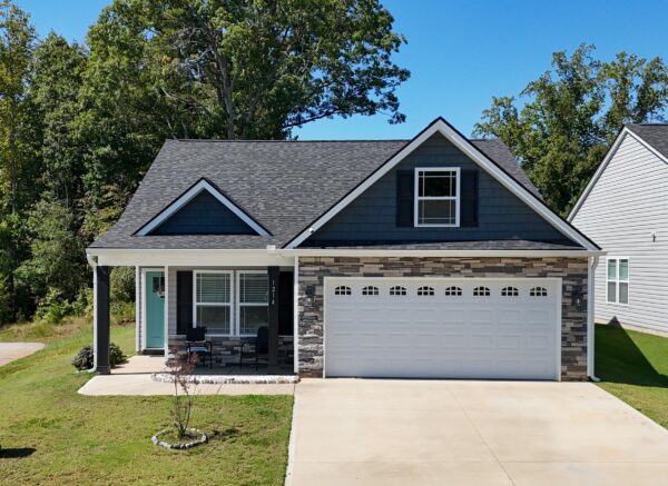 Find the perfect family home in Greenville, SC, with ample space and a beautiful backyard