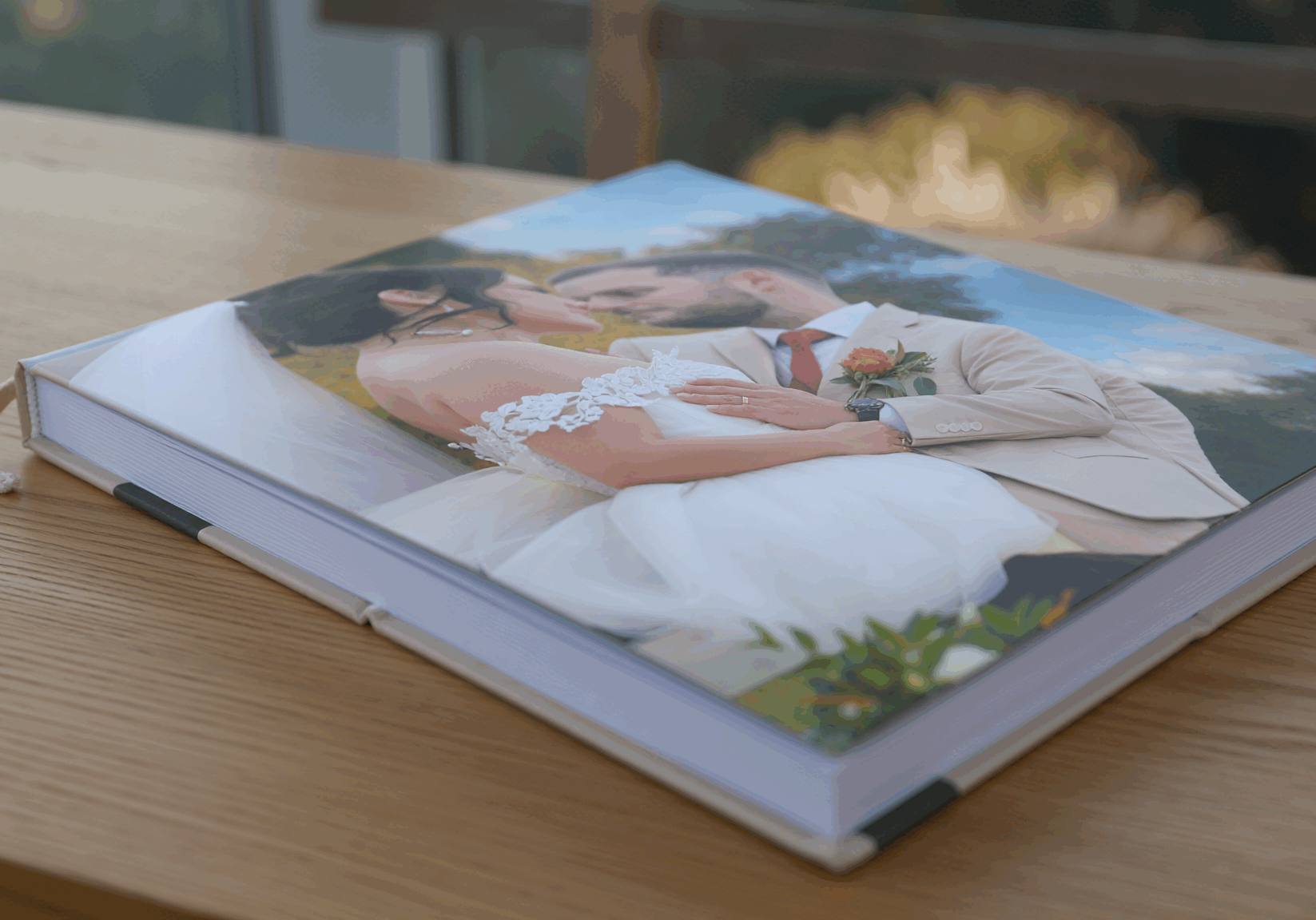 High-quality CBCinematics wedding album featuring a romantic bride and groom portrait on the cover, showcasing professional Greenville SC wedding photography.