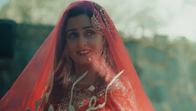 Indian bride under a red veil