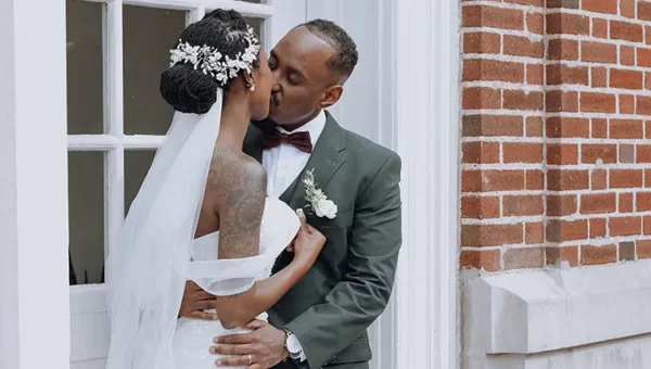 Keke and Lucas, bride & groom, kissing